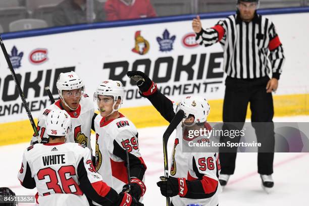 Ottawa Senators center Colin White , Ottawa Senators defenceman Jordan Murray , Ottawa Senators right wing Gabriel Gagne and Ottawa Senators left...