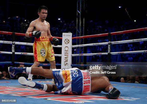 Roman Gonzalez of Nicaragua is knocked down for the first time against Srisaket Sor Rungvisai of Thailand at StubHub Center on September 9, 2017 in...