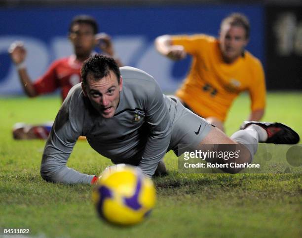 Australian goalkeeper Eugen Galekovic watches a shot during the AFC Asian Cup 2011 Qualification match between Indonesia and Australia held at Gelora...
