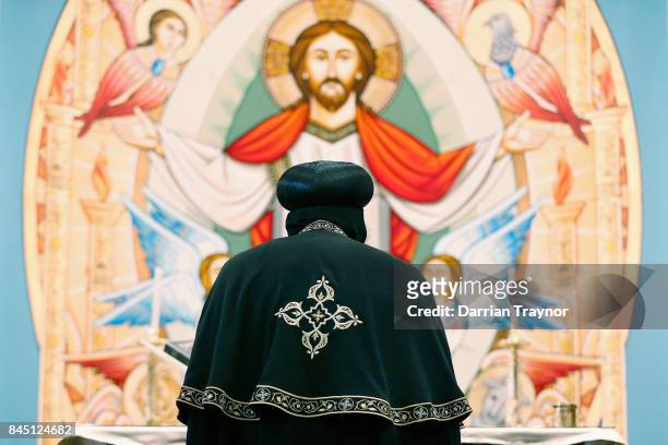 Coptic Pope Tawadros II recites a prayer in the new Cpotic church inside Eporo Tower on September 10, 2017 in Melbourne, Australia. Pope Tawardros II...