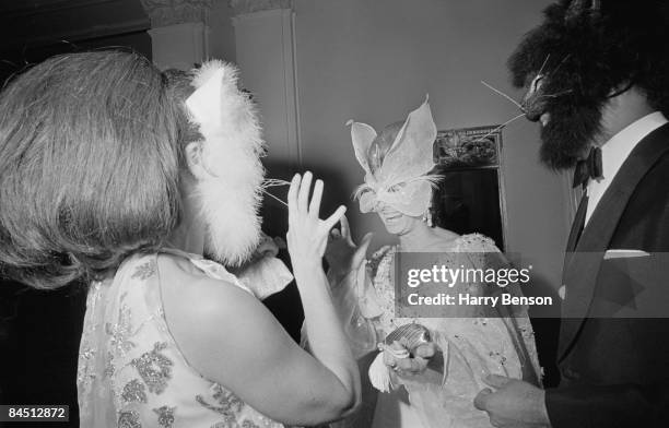 Masked guests at Truman Capote's Black-and-White Ball in the Grand Ballroom of the Plaza Hotel, New York City, 28th November 1966.