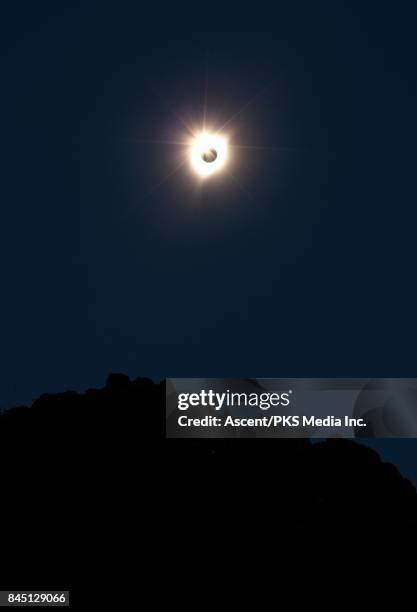 solar eclipse against dark sky - solar eclipse in canada stock pictures, royalty-free photos & images