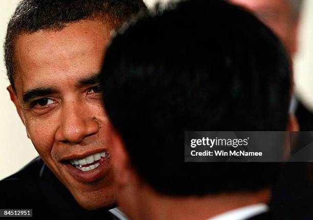 President Barack Obama greets business leaders and guests after speaking on the U.S. Economy from the East Room of the White House January 28, 2009...