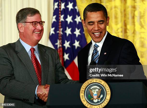 President Barack Obama greets Sam Palmisano, Chairman, CEO and President of IBM before speaking on the U.S. Economy from the East Room of the White...