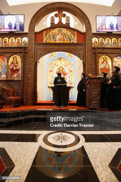 Coptic Pope Tawadros II recites a prayer in the new Coptic church inside Eporo Tower on September 10, 2017 in Melbourne, Australia. Pope Tawardros II...