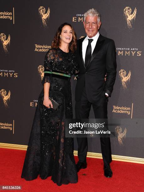 Asia Argento and Anthony Bourdain attend the 2017 Creative Arts Emmy Awards at Microsoft Theater on September 9, 2017 in Los Angeles, California.