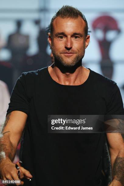 Designer Philipp Plein walks the runway at the Philipp Plein Spring/Summer 2018 collection fashion show during New York fashion week on September 9,...