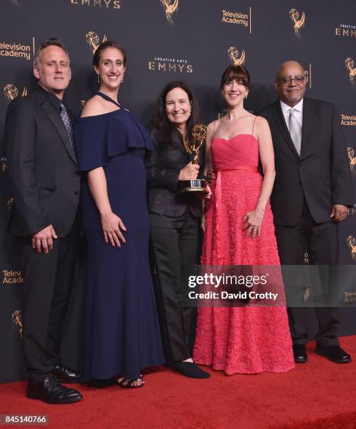 Jim Sommers, Lisa Tawil, Sally Jo Fifer, Lois Vossen, and Garry Denny pose in the press room with the governors award at the 2017 Creative Arts Emmy...