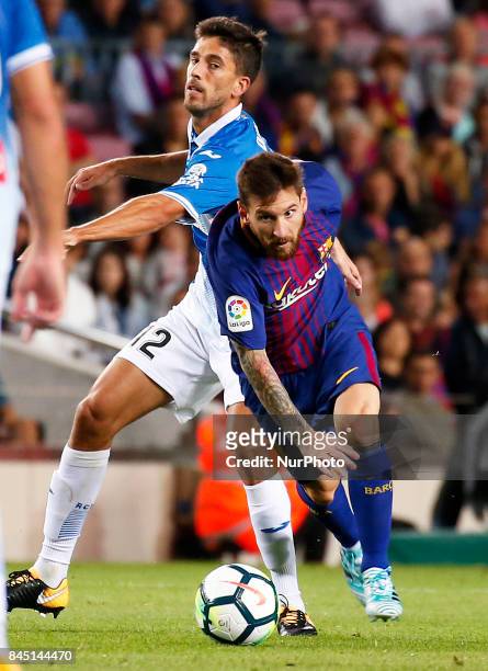 Leo Messi and Didac Vila during La Liga match between F.C. Barcelona v RCD Espanyol, in Barcelona, on September 09, 2017.