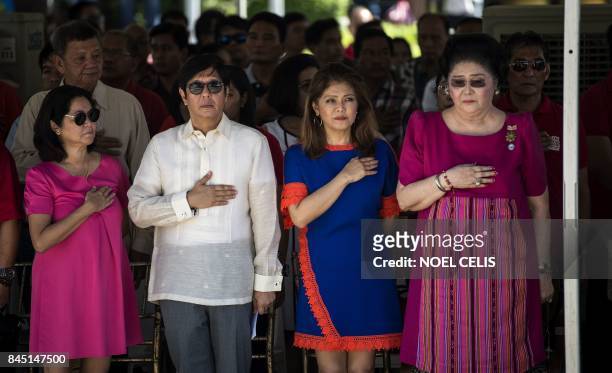 Ferdinand "Bongbong" Marcos Jnr , former senator and son of the late dictator Ferdinand Marcos, his sister Imee and their mother, former Philippine...