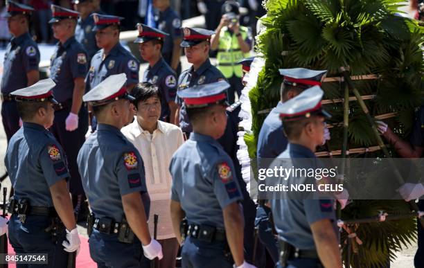 Ferdinand "Bongbong" Marcos Jnr , former senator and son of the late dictator Ferdinand Marcos, visits to offer a wreath at a monument to his father...