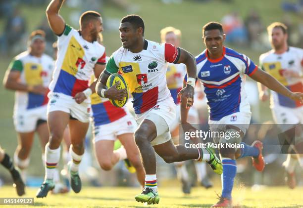 Paula Balekana of the Rays makes a line break during the round two NRC match between the Rays and the Rams at Macquarie Uni on September 10, 2017 in...