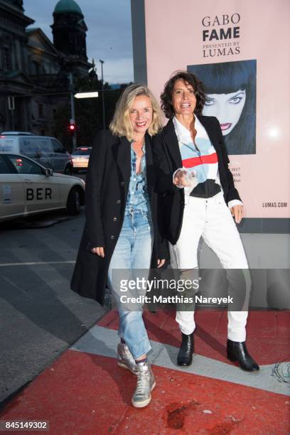 Ulrike Folkerts and Katharina Schnitzler attend the 'Gabo: Fame' Exhibition Opening at Humbold-Box on September 9, 2017 in Berlin, Germany.
