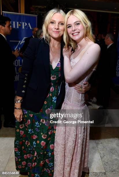 Laura Brown and Elle Fanning attend The Hollywood Foreign Press Association and InStyles annual celebrations of the 2017 Toronto International Film...