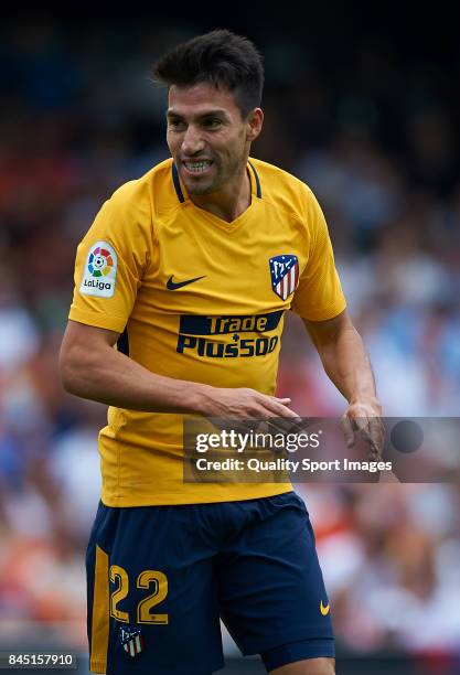 Nico Gaitan of Atletico Madrid reacts during the La Liga match between Valencia and Atletico Madrid at on September 9, 2017 in Valencia, .