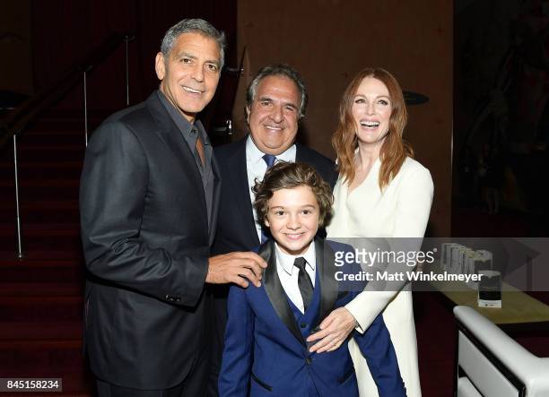 George Clooney, Chairman/CEO of Paramount Pictures Jim Gianopulos, Noah Jupe, and Julianne Moore attend the premiere of "Suburbicon" during the 2017...