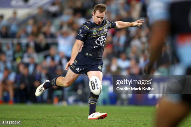 Michael Morgan of the Cowboys kicks a field goal during the NRL Elimination Final match between the Cronulla Sharks and the North Queensland Cowboys...