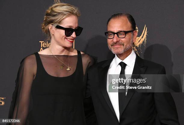 Producer Alexis Bloom;Fisher Stevens arrives at the 2017 Creative Arts Emmy Awards - Day 1 at Microsoft Theater on September 9, 2017 in Los Angeles,...