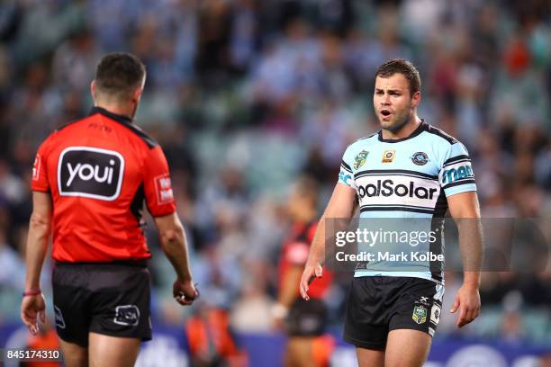 Luke Lewis of the Sharks shows his frustration to referee Gavin Badger during the NRL Elimination Final match between the Cronulla Sharks and the...