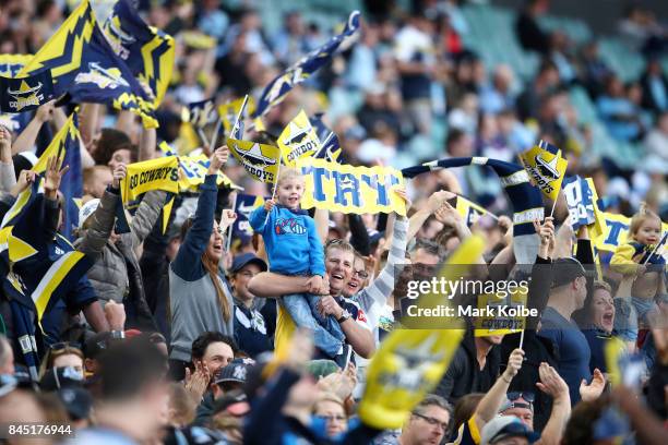 Cowboys supporters cheer after a try during the NRL Elimination Final match between the Cronulla Sharks and the North Queensland Cowboys at Allianz...