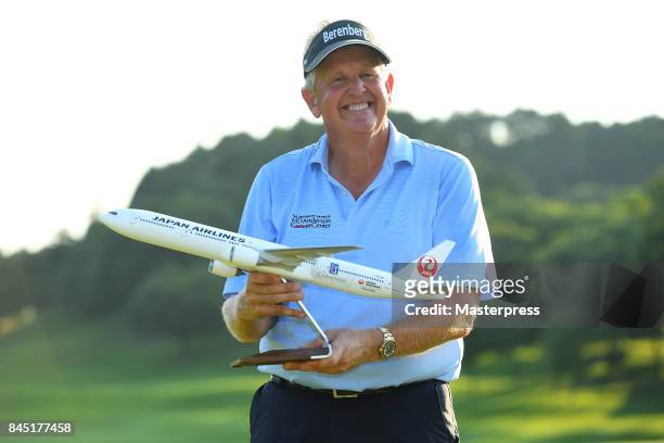 Colin Montgomerie of Scotland poses with the trophy after winning the Japan Airlines Championship at Narita Golf Club-Accordia Golf on September 10,...