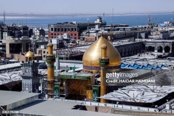 Picture taken on September 10, 2017 shows a view of the golden dome of Imam Ali's shrine in the Iraqi holy city of Najaf during Eid al-Ghadir, which...