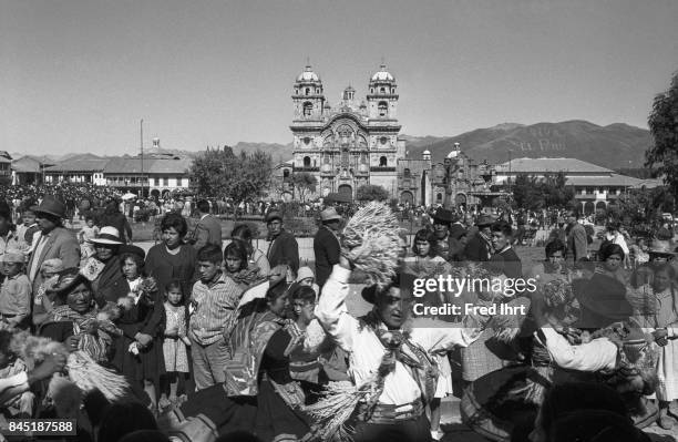 Peruvian people in front of the church Iglesia de la Compania de Jesus at Cusco´s Plaza de Armas during the festival of the sun, Inti Raymi....