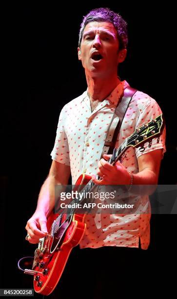 British musician Noel Gallagher with his band Noel Gallagher's High Flying Birds performs during the 'We Are Manchester' charity concert at the...