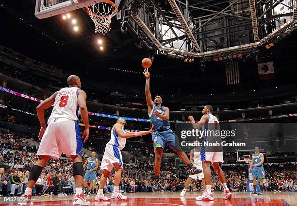 Al Jefferson of the Minnesota Timberwolves shoots a jump shot in the lane during the game against the Los Angeles Clippers at Staples Center on...