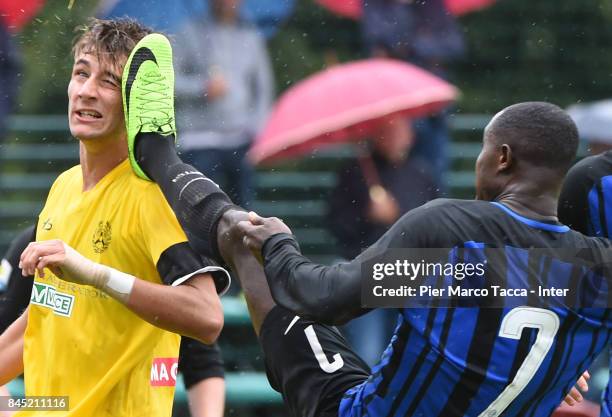 Filippo Paoluzzi of Udinese Calcio hit in the face by Stephen Danso of FC Internazionale U19 during the Serie A Primavera match between FC...