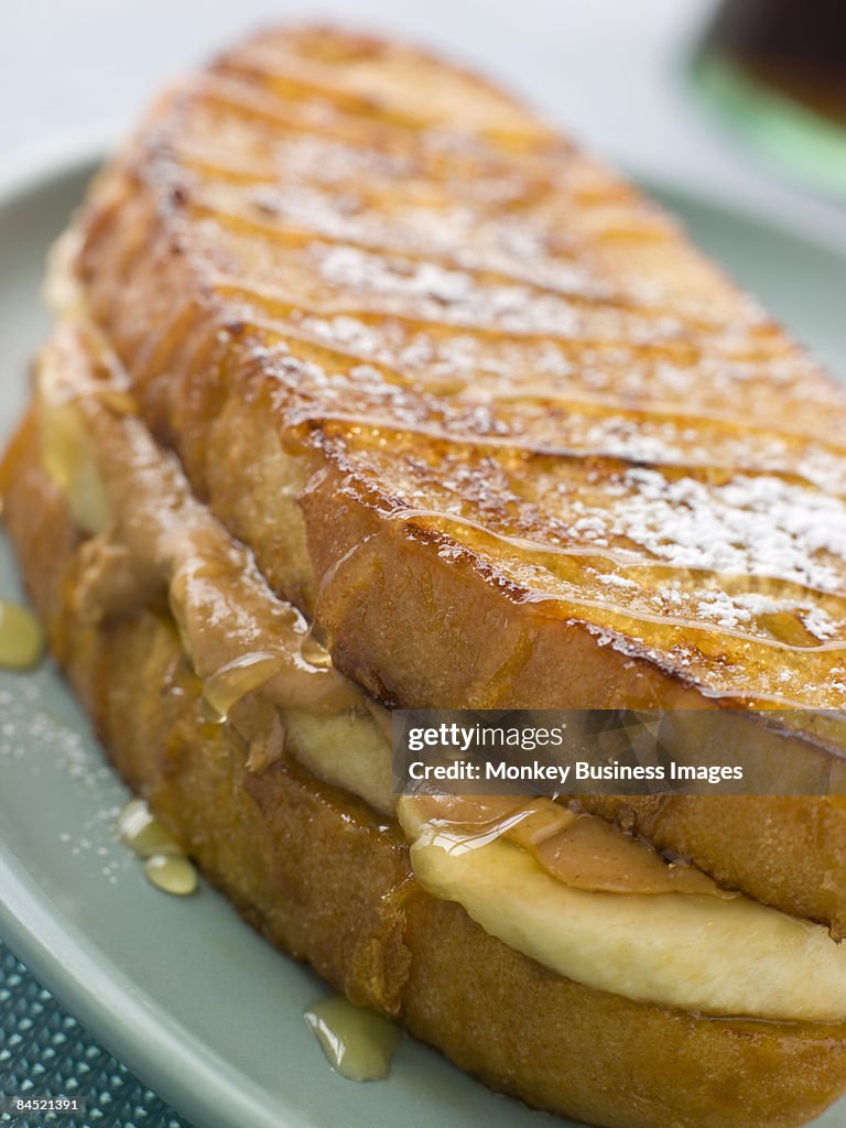 Peanut Butter And Banana Eggy Bread Sandwich With Syrup