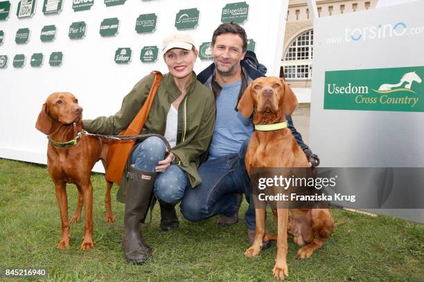 Sanna Englund and her husband Marco Fischer attend the Till Demtroeders Charity-Event 'Usedom Cross Country' at Schloss Stolpe on September 9, 2017...
