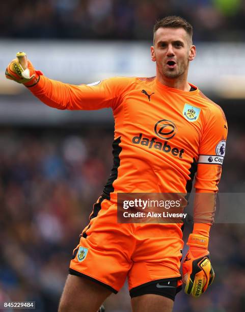 Thomas Heaton of Burnley celebrates after his side score their first goal during the Premier League match between Burnley and Crystal Palace at Turf...