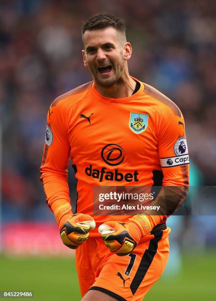 Thomas Heaton of Burnley celebrates after his side score their first goal during the Premier League match between Burnley and Crystal Palace at Turf...