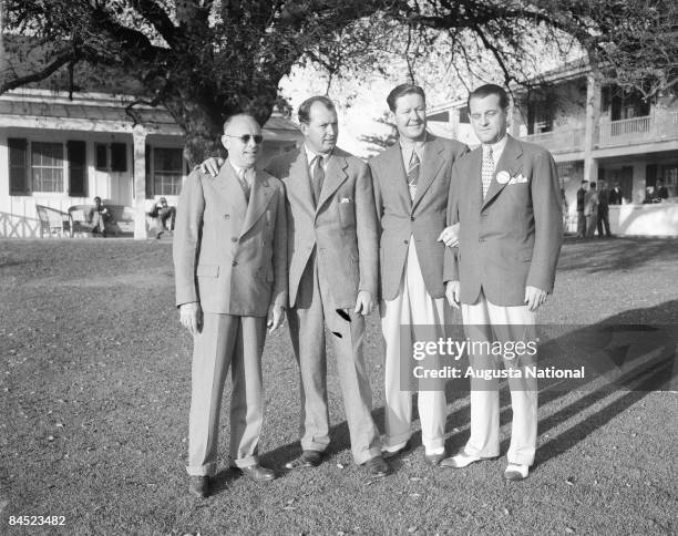 1940s: Ed Dudley and Byron Nelson pose with two gentlemen in front of the Clubhouse during a 1940s Masters Tournament at Augusta National Golf Club...