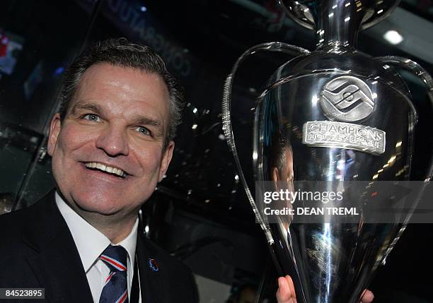 Lions head coach Sean Simpson celebrates with the Silver Stone trophy after the Champions Hockey League Final 2 between Russian club Metallurg...