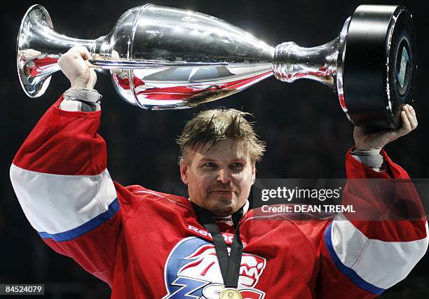 Lions goalkeeper Ari Sulander celebrates with the Silver Stone trophy after the Champions Hockey League Final 2 between Russian club Metallurg...