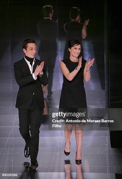 Designers Maria Grazia Chiuri and Pier Paolo Piccioli walk the runway at the Valentino fashion show during Paris Fashion Week Haute Couture...