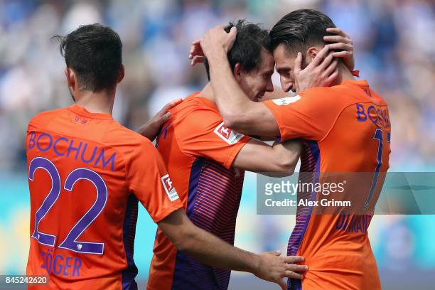 Robbie Kruse of Bochum celebrates his team's second goal with team mates Dimitrios Diamantakos and Kevin Stoeger during the Second Bundesliga match...