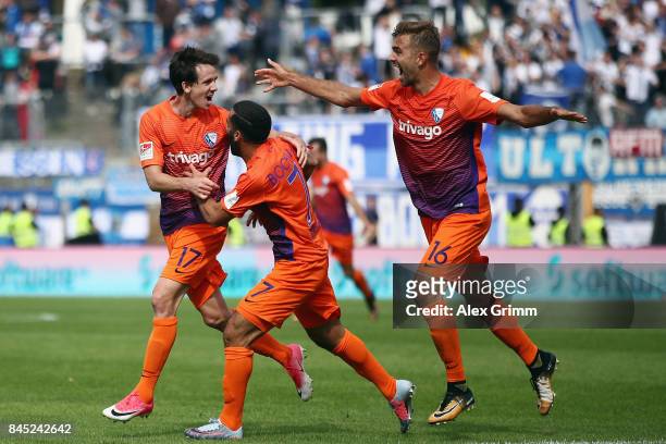 Robbie Kruse of Bochum celebrates his team's second goal with team mates Selim Guenduez and Lukas Hinterseer during the Second Bundesliga match...