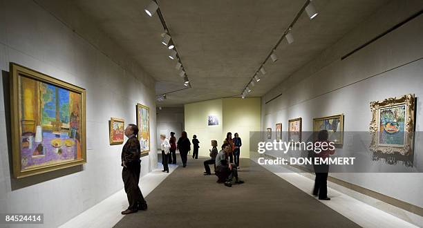 Viewers look at paintings by Pierre Bonnard January 28, 2009 at the Metropolitan Museum of Art in New York. The collection of the French artist's...