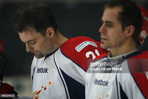 Metallurg's Jaroslav Kudrna and Tomas Rolinek stand dejected after the Champions Hockey League Final 2 between Russian club Metallurg Magnitogorsk...