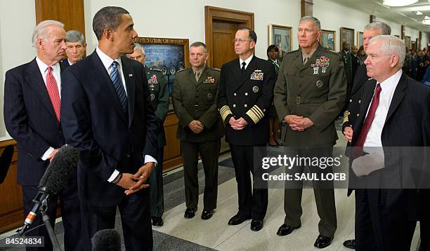 President Barack Obama, with US Vice President Joe Biden and Chairman of the Joint Chiefs of Staff, Admiral Mike Mullen , speaks alongside the Joint...