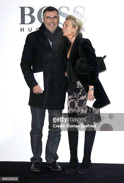 Host Sabine Christiansen and husband Norbert Medus attend the Boss Black fashion show during the 'Mercedes Benz Fashion Week' A/W 2009 at Botanischer...