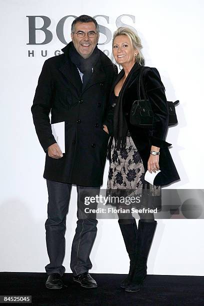 Host Sabine Christiansen and husband Norbert Medus attend the Boss Black fashion show during the 'Mercedes Benz Fashion Week' A/W 2009 at Botanischer...