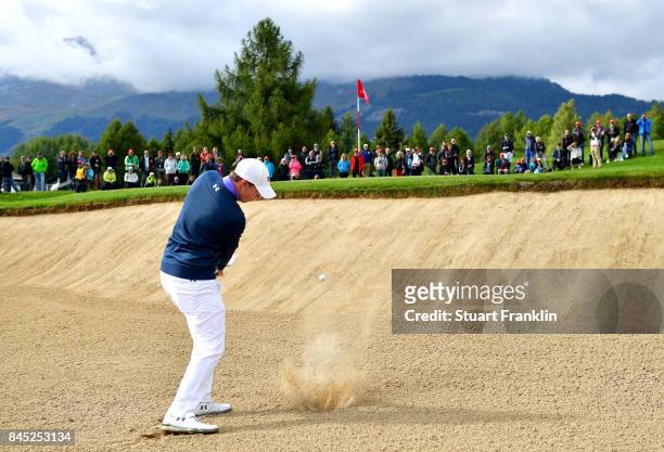 Matthew Fitzpatrick of England plays a shot from a bunker on the 17th hole during Day Five of the Omega European Masters at Crans-sur-Sierre Golf...