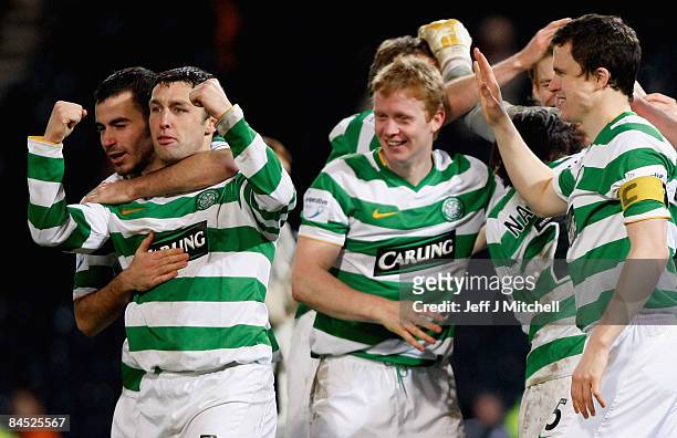 Scott MacDonald of Celtic celebrates with team mates after scoring the wining goal in a penalty shoot out during the the Co-operative Insurance Cup...