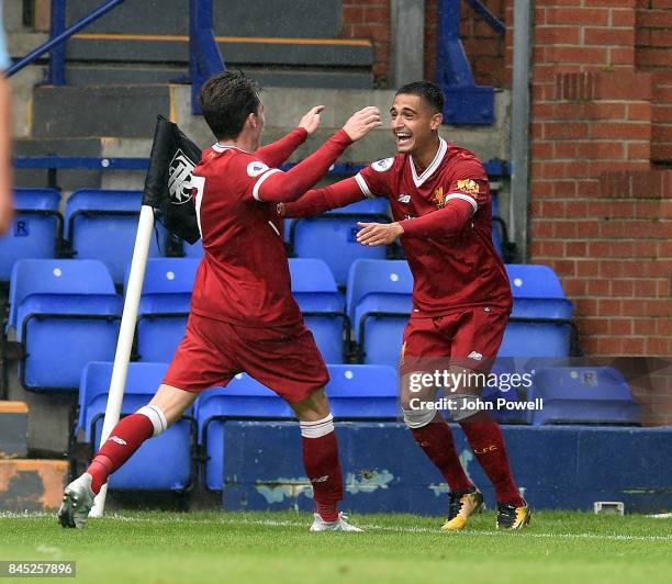 Yan Dhanda of Liverpool celabrates scoring the winning goal during the game at Prenton Park on September 10, 2017 in Birkenhead, England.