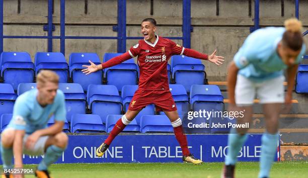 Yan Dhanda of Liverpool celabrates scoring the winning goal during the game at Prenton Park on September 10, 2017 in Birkenhead, England.