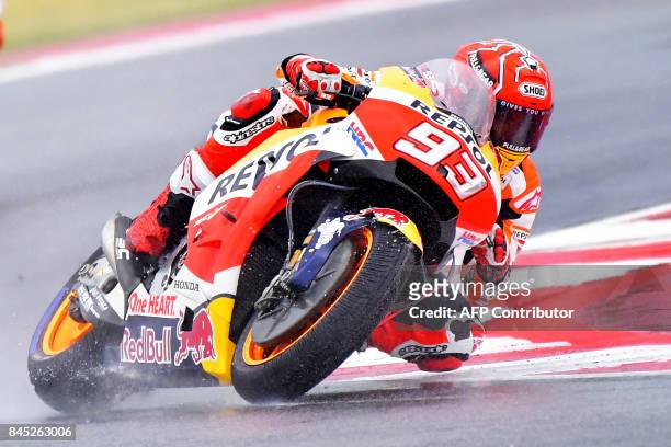 Repsol Honda Team's Spanish rider Marc Marquez competes during the San Marino Moto GP Grand Prix at the Marco Simoncelli Circuit in Misano, on...